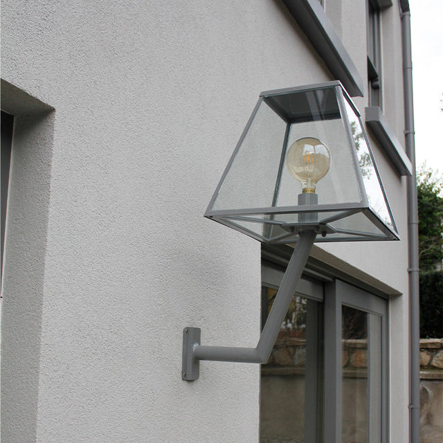 Contemporary wall light with angled bracket