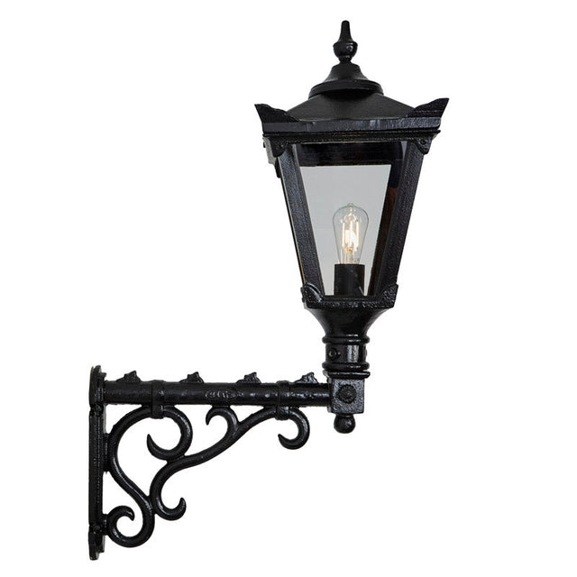 Victorian traditional cast iron wall light with decorative arm