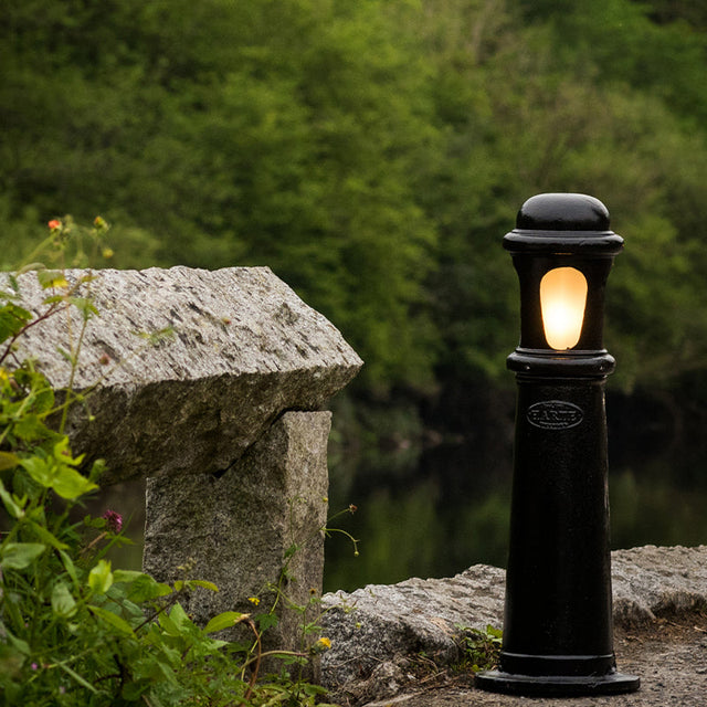 Decorative bollard light in cast iron