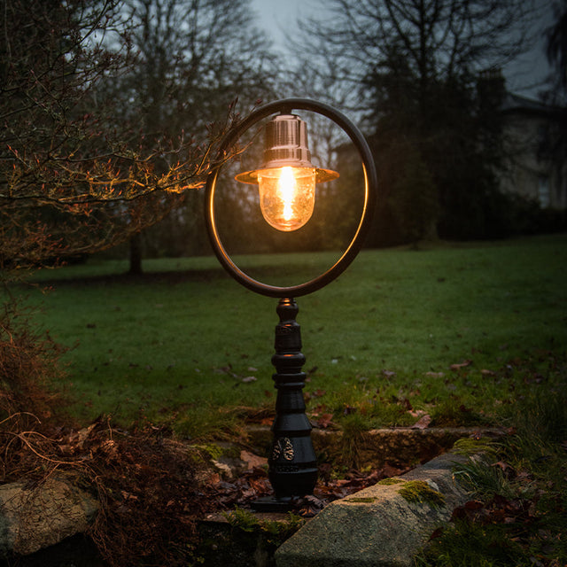 Copper railway style pedestal light in cast iron