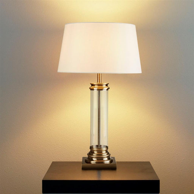 PEDESTAL TABLE LAMP - GLASS COLUMN & ANTIQUE BRASS BASE, CREAM SHADE